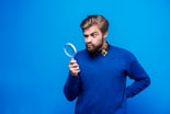 Getty Magnifying Glass with Bearded Man