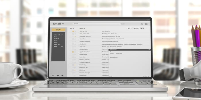 Email inbox up on laptop screen