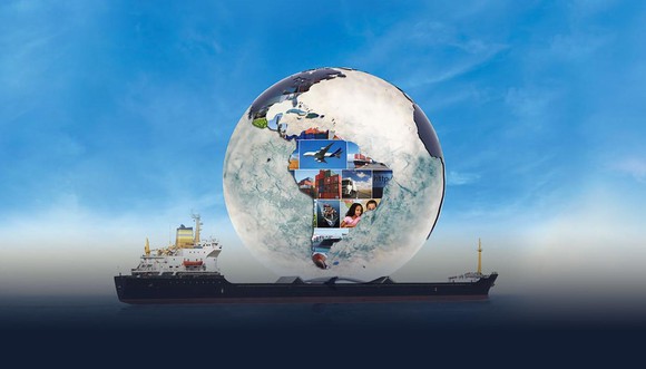 Shipping vessel carrying glass globe with pictures of various economic activities.