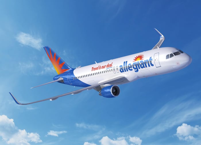 An Airbus A-320 in Allegiant colors.