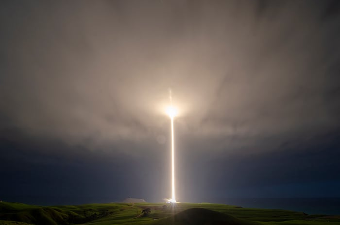 Rocket Lab Electron rocket blasting into cloud cover