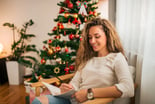Getty Christmas Tree with Woman Writing