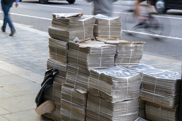 Stacks of bundled newspapers