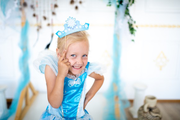 Girl dressed up as a princess.