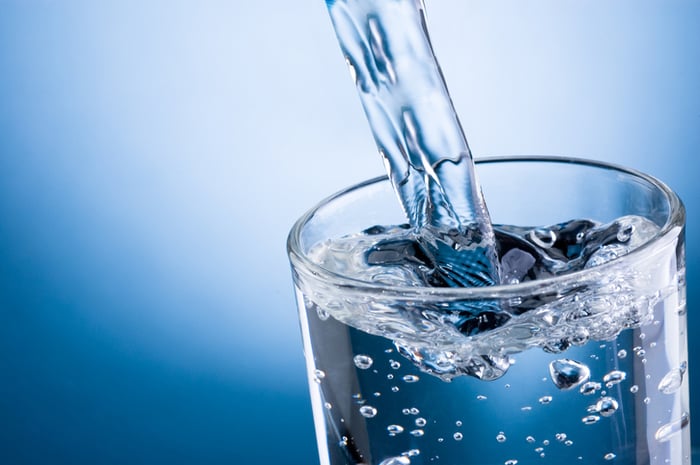 Water pouring into a glass.