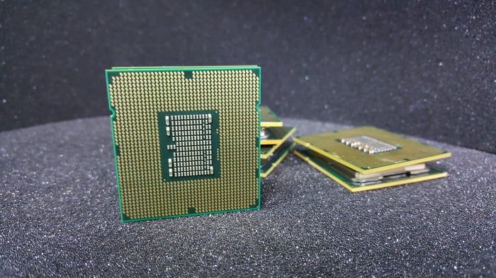 Intel processors on a black table. 