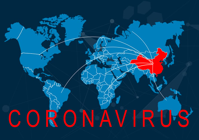 Blue world map with China in red, word CORONAVIRUS and vectors leading away from China