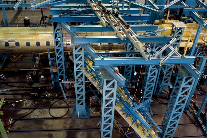 Aircraft under construction on an assembly line