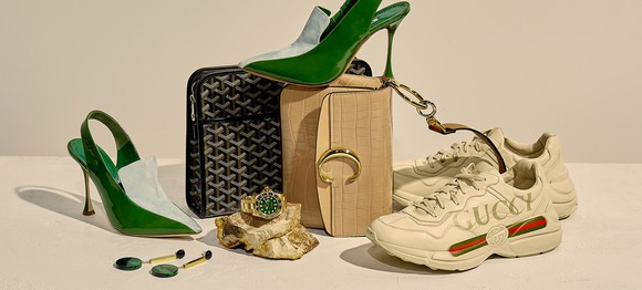 An assortment of pre-owned luxury items: shoes, handbags, and jewelry.