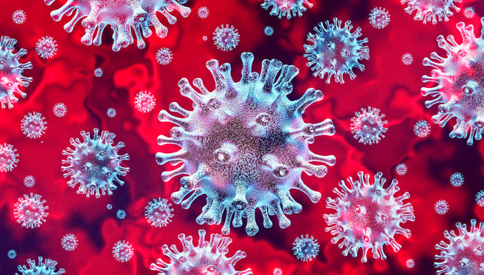 3-D rendering of viruses on a red background