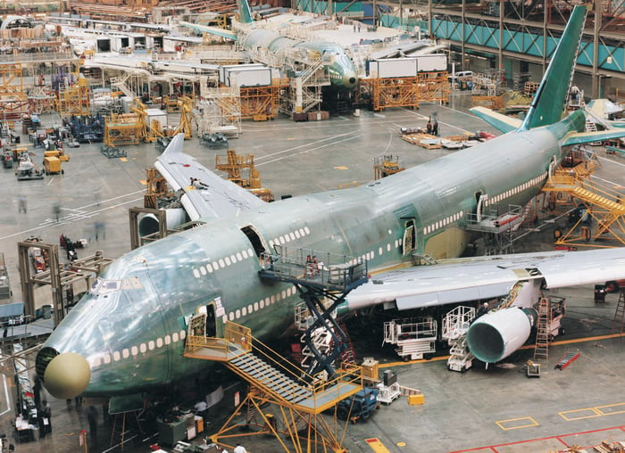 An airplane assembly line.