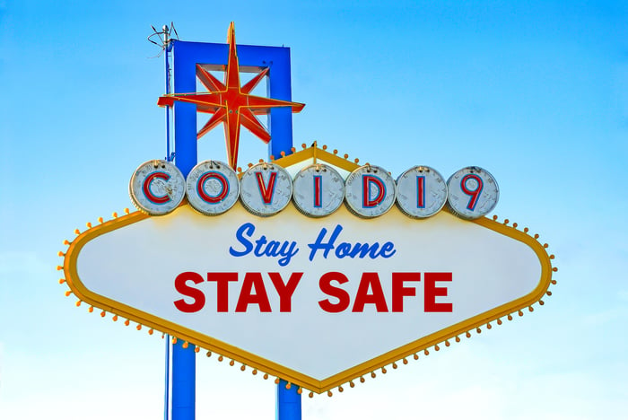 Mock Las Vegas sign that says "COVID19 Stay Home Stay Safe"