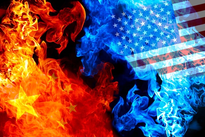 Representations of flags from the U.S. and China in fire and smoke