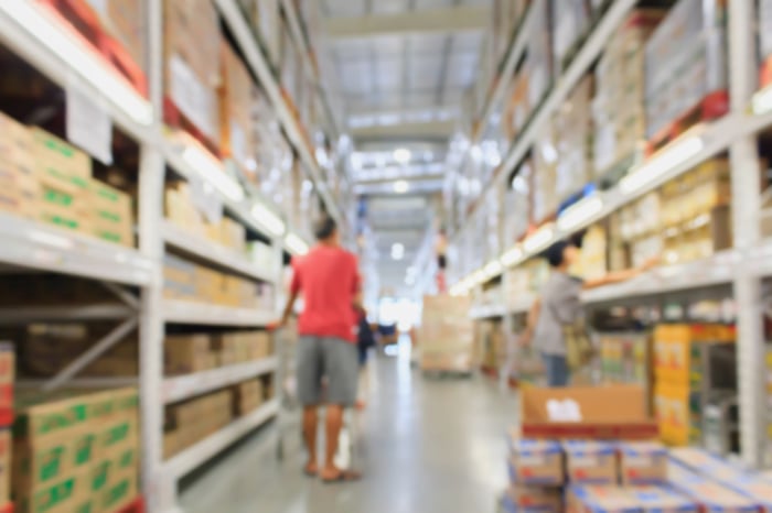 An aisle in a warehouse club store.