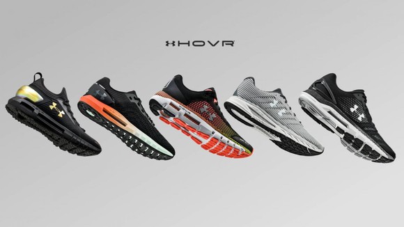 Five Under Armour Hovr shoes in a line