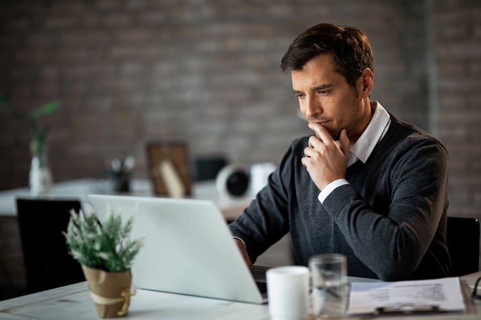 Man staring at laptop screen