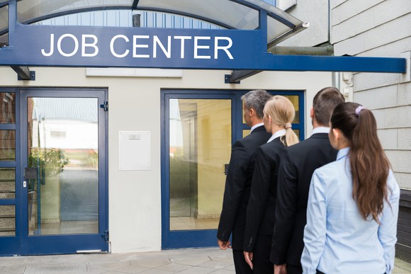 People  lined up outside a job center