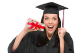 GettyImages-488180591  -- Female College Graduate Holding a stack of cash