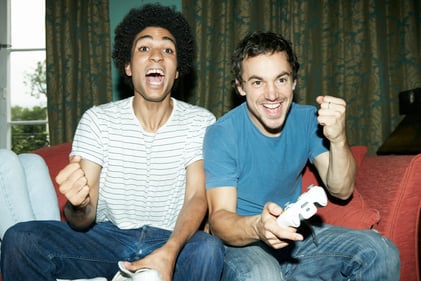 Two guys playing video games 2