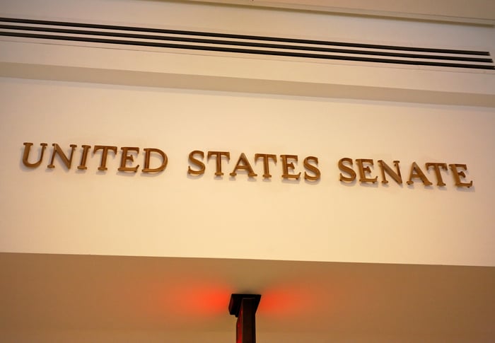 The words United States Senate written in gold