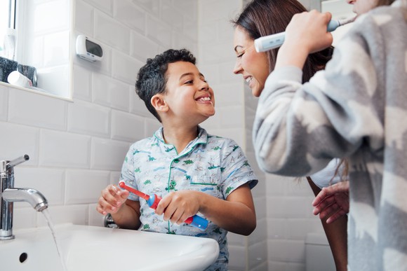 A child brushing his teeth.