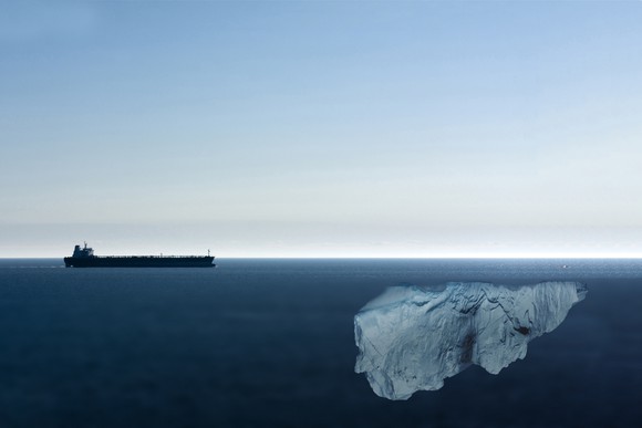 An ship approaching a hidden ice berg