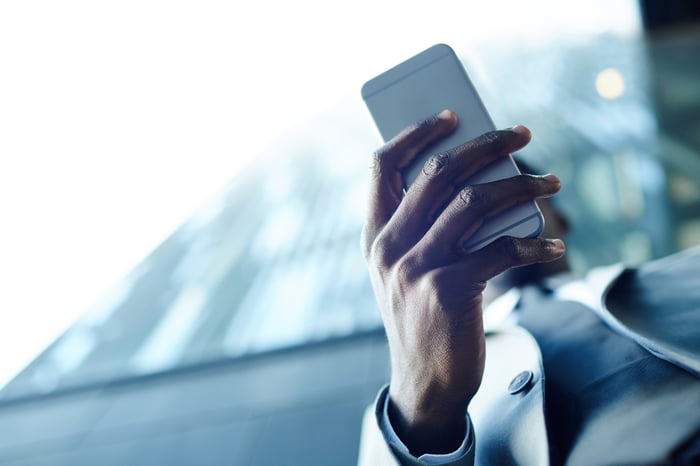 Person holding a smartphone.