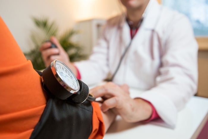 Man getting his blood-pressure checked.