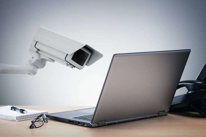 CCTV camera pointed at laptop