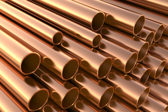 A stack of copper pipes.