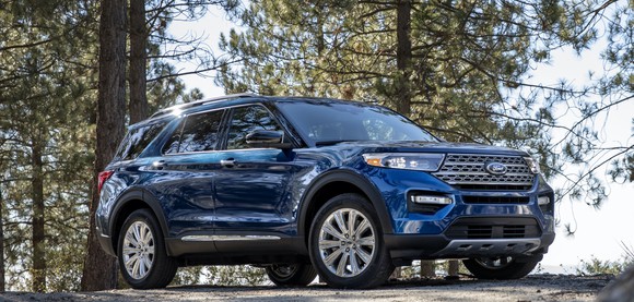 A blue 2020 Ford Explorer, a three-row crossover SUV.