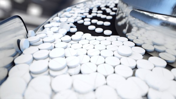 Pills on a conveyor belt.