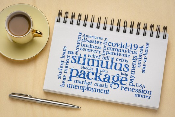 Notebook with stimulus package in the center and other related key words surrounding it.