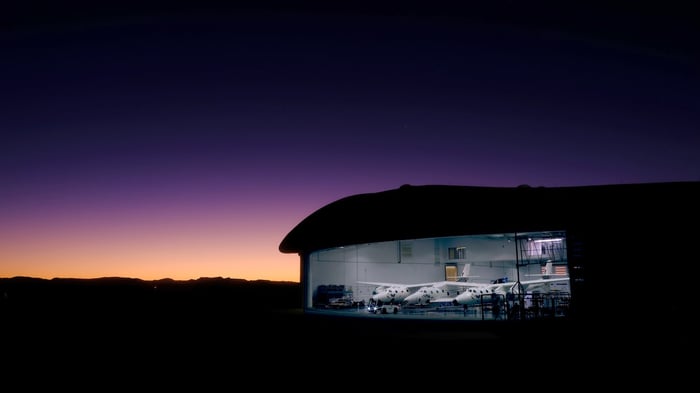 VSS Unity and VMS Eve in their hangar in New Mexico at daybreak