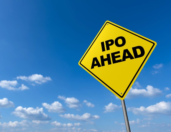 A yellow road sign says IPO ahead.