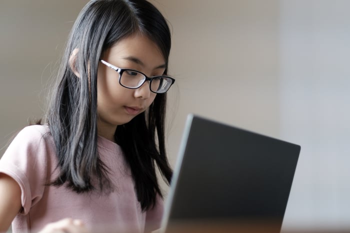 Girl with an open laptop