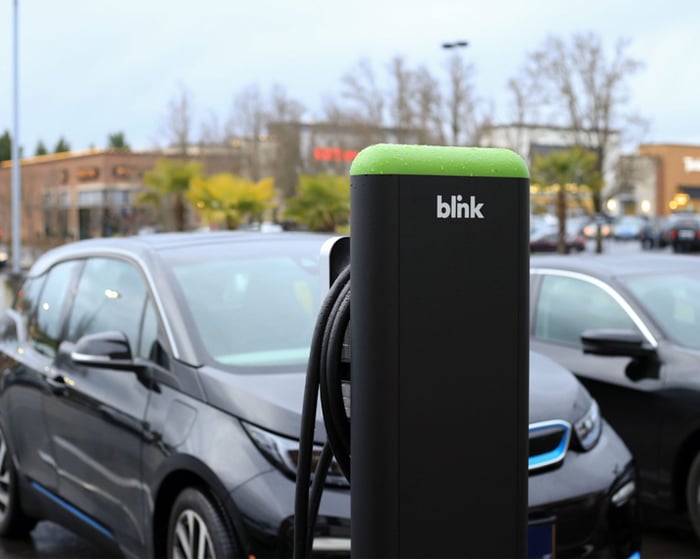Blink Charging EV charger in parking lot