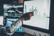 18_08_21 An arm pointing to graph on computer screen _GettyImages-629202004