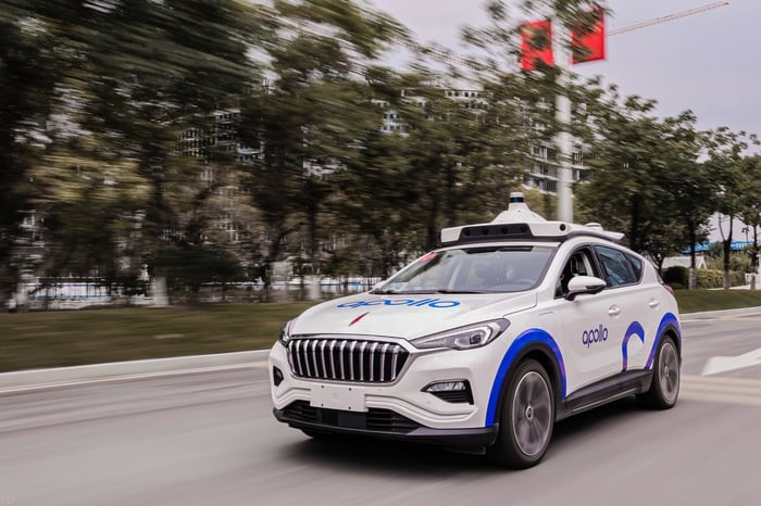 A Baidu Apollo robotaxi driving on the road