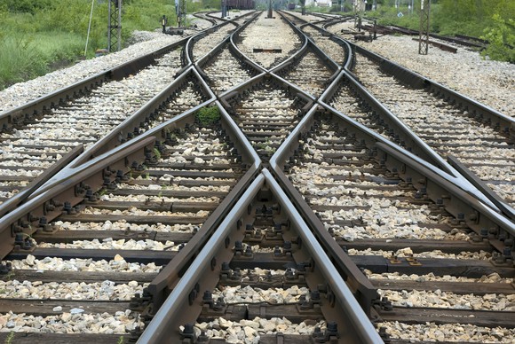 Train tracks crossing each other.