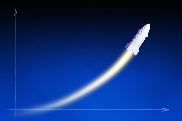 Cartoon rocket zooming up like a stock on a chart.