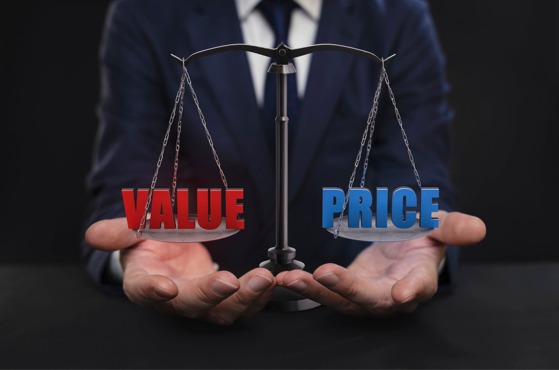 A balance with words VALUE and PRICE on the two sides.
