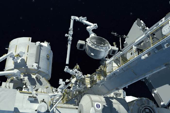 Nanoracks Bishop Airlock being attached to the International Space Station.