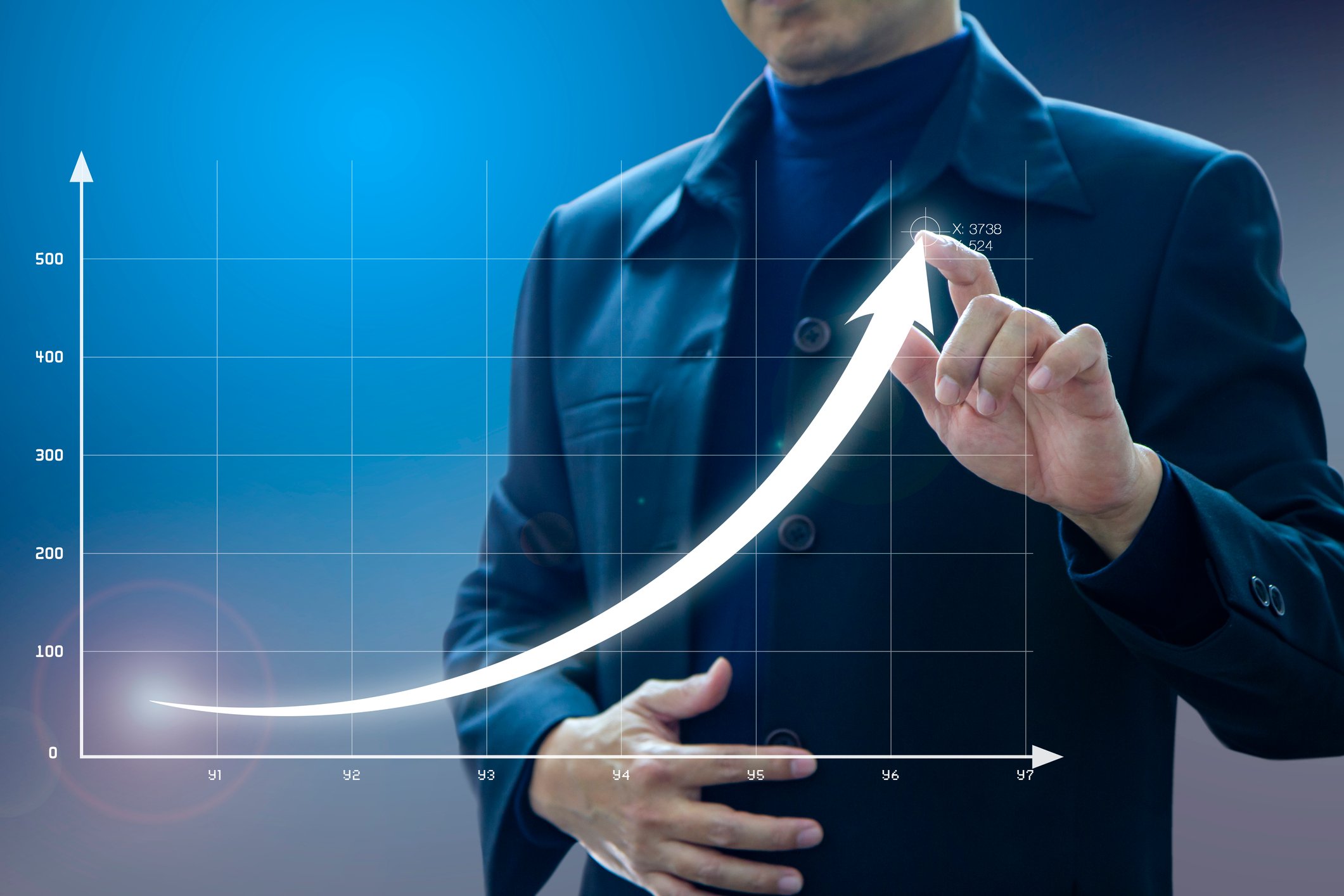 a businessman draws exponential growth curve on chart