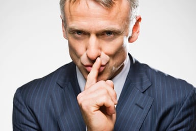 a man saying shhh - secret