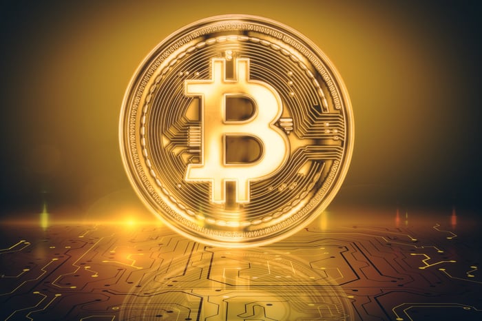 A Bitcoin logo.