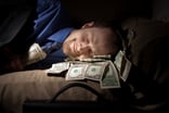 Sleeping-man-dollars