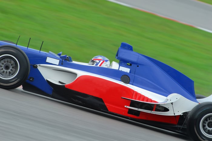 Formula 1 racecar in French colors red, white, and blue.