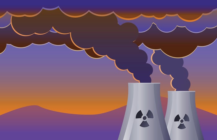 Cartoon picture of two nuclear reactors generating steam in dark shades