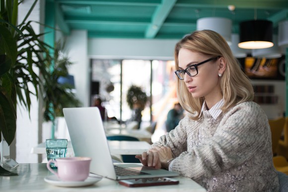A woman using a computer.